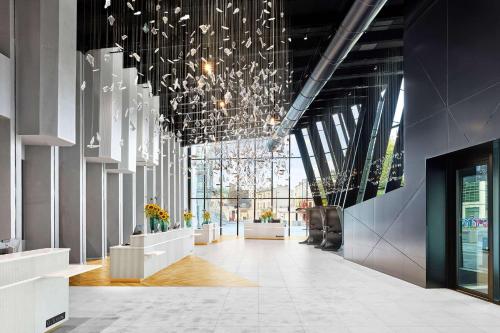 Lobby, H4 Wyndham Paris Pleyel in Paris