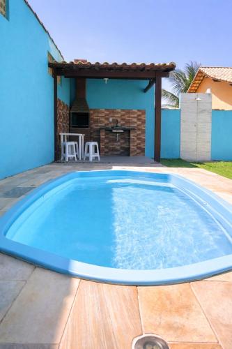 Casa do lado da praia com piscina, churrasqueira e ar condicionado – khách sạn tại Unamar