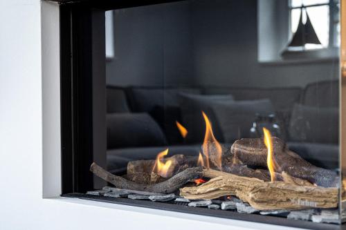 Modernes Ferienhaus mit Sauna eingezäuntem Garten und Strandnähe Ideal für Familien Freunde und Hundeliebhaber - image 5