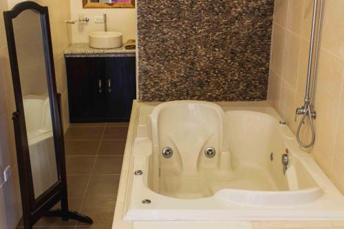 Ванна кімната, Tuzco Lodge in Пуерто Лопез