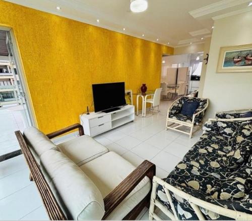 Ap na praia Pitangueiras com 2 vagas Guarujá apartamento – khách sạn tại Barra Funda