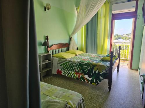 La maison aux Orchidées (La maison aux Orchidees) in Πτι-Μπουργκ