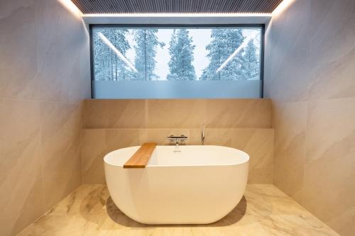 Badezimmer, Wilderness Hotel Saariselkä (Wilderness Hotel Saariselka) in Inari