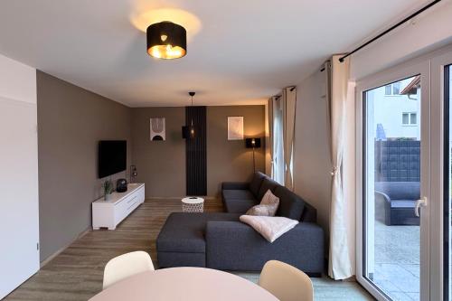 Koplietošanas atpūtas telpa ar TV, Modernes 118qm Haus für Ferien und Arbeit (Modernes 118qm Haus fur Ferien und Arbeit) in Remchingen