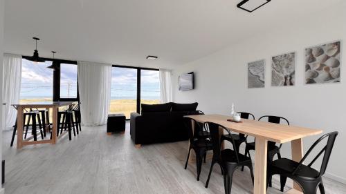 Koplietošanas atpūtas telpa ar TV, Marea Baja - Casa con vista al mar para 6 PAX con parrilla en Cruz del Sur, Chapadmalal - Hola Sur in Chapadmalal