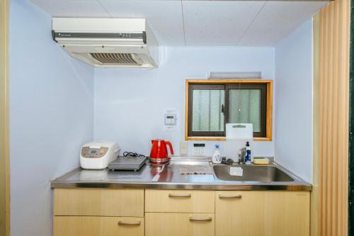 Kitchen, 熱海 仲夏 初島を臨む絶景プライベート別荘 in Kamitaga