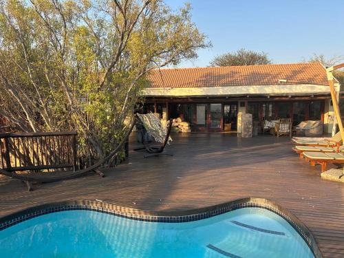 Balkons/terase, Luxury Villa at Elements Golf Course - Bela Bela in Waterberg Estate