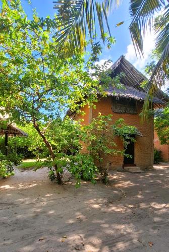 Kipepeo Beach and Village Room Type - Triple Room with Garden View