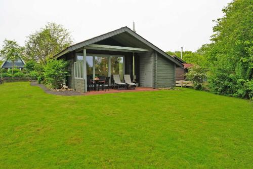 Blockhaus mit grosser überdachter Terrasse in Damp, Deutschland