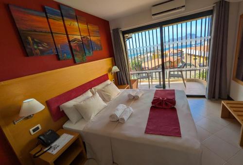 Quarto duplo, lado do mar