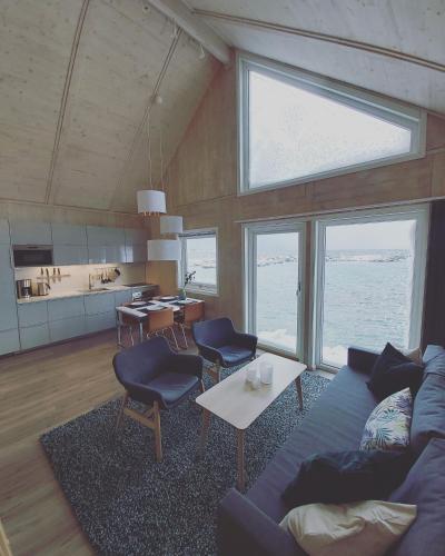 Camp Solbergfjord - Modern sea lodges in Sorreisa