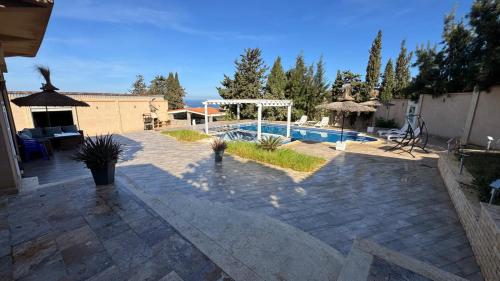 villa – khách sạn tại Ain El Turk