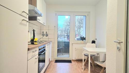 Konyha, 3 Zimmer I Küche I Balkon I WLAN I Parken I Seepark (3 Zimmer I Kuche I Balkon I WLAN I Parken I Seepark) in Lünen