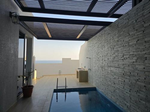 Sea Wind Chalet in Tiwi