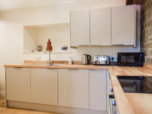virtuve, Wheelwright Cottage in Kluntona