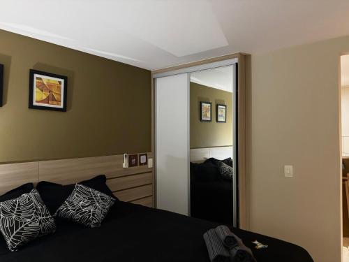 Flat com Ar, Piscina, Garagem, Cozinha e Wi-Fi