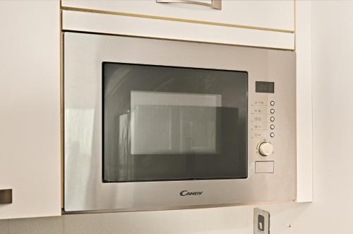 Modern 1BDR Apt With Balcony Pool Access And JVC - image 3