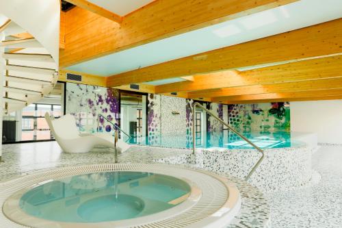Джакузі, Fabryka Welny Hotel & Spa in Паб'яніце