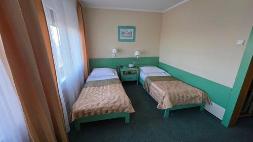 Hotel Gromada Pila - Tap to explore photos