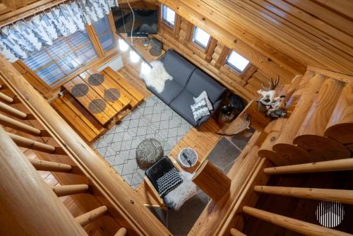 Koplietošanas atpūtas telpa ar TV, Villa Kuksa by Holiday in Lapland in Vesikkovaara