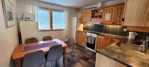 Huset i skogskanten i Bodø in Tverlandet