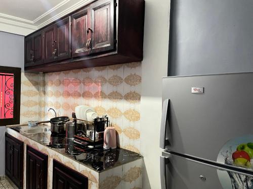 NGK Hôtel Apartment (NGK Hotel Apartment) in บาฟูซซัม