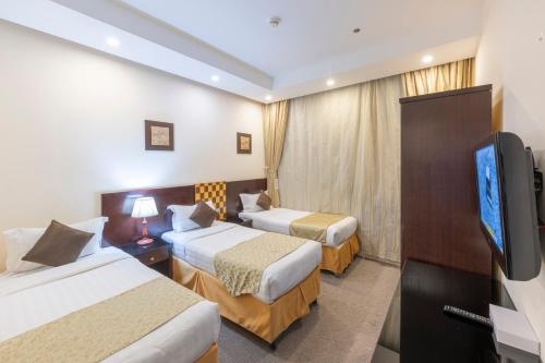 Chambre triple, 3 lits