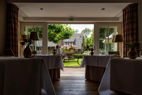 Ресторан, Landhuishotel De Bloemenbeek in Де Лют