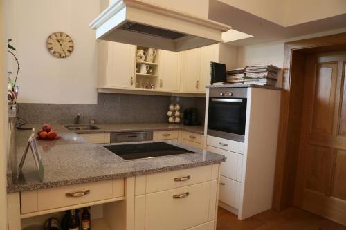 Kitchen, Ferienwohnungen Schlader in Zell Am Moos