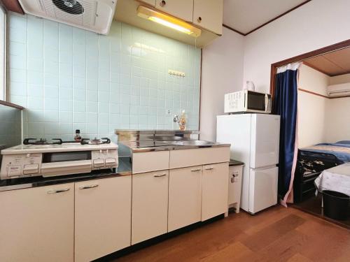2号房 閑静な住宅街でご宿泊ください 天神博多巨蛋に直行するバスがあります