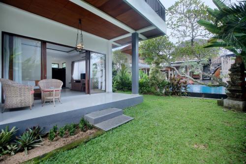 Putri Ayu Cottages Room Type - Super Deluxe Double or Twin Room