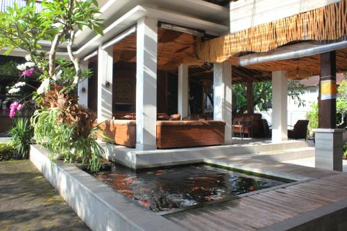 Putri Ayu Cottages - Tap to explore photos