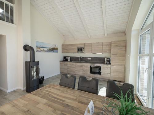 Ferienhaus Theodor Storm 70 mit Garten in 達格比爾