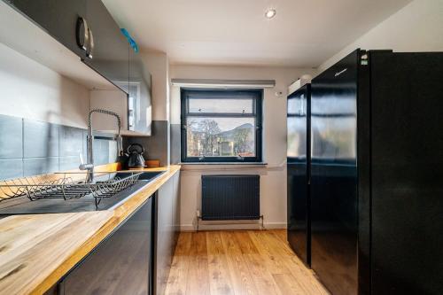 Kitchen, Bottom of Royal Mile 7 Beds Sleeps 8 3 Bthrooms in Royal Mile