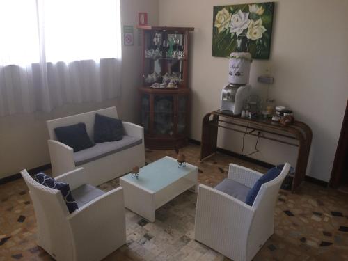 Koplietošanas atpūtas telpa ar TV, Pousada Realiza in Cambuquira
