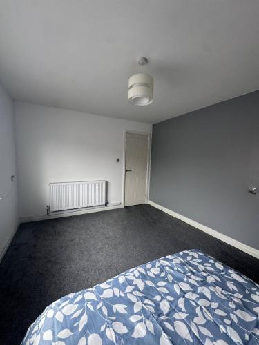 Cozy Room in shared flat 25 minutes away from the city centre in Oldham