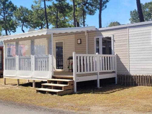 Mobil-home 34m² avec Terrasse - 2 Chambres, Capacité 4 Pers. - API-1-52-1455