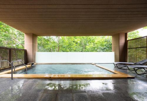 Open air bath, Hotel Kanronomori in Rankoshi