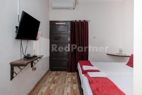 Hotel O Art Guest House Syariah - Tap to explore photos