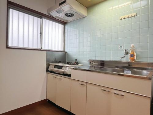 2号房 閑静な住宅街でご宿泊ください 天神博多巨蛋に直行するバスがあります