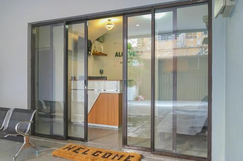 Entrance, Urbanview Hotel Aloevera Pontianak by RedDoorz in Pontianak