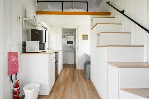 Sacred Ground by Tiny Away in Okato