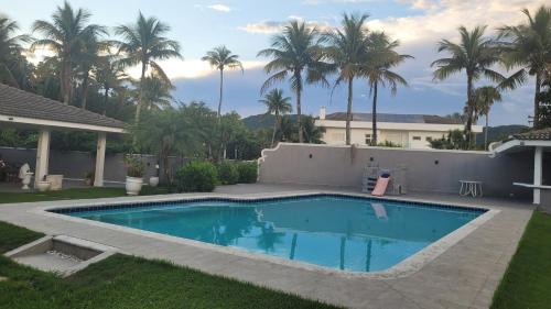 Suites em casa de luxo no guaruja in Jardim Acapulco