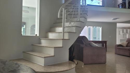 Suites em casa de luxo no guaruja in Jardim Acapulco