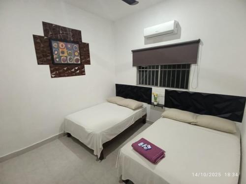 Hotel y Hostal AH MUN