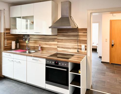 Konyha, Großzügige OG Ferienwohnung in Linkenheim frieden apartments (Großzugige OG Ferienwohnung in Linkenheim frieden apartments) in Eggenstein-Leopoldshafen