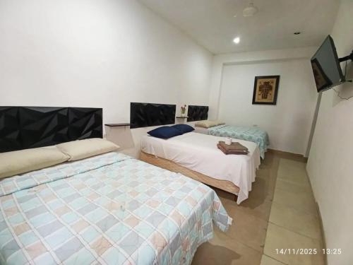 Hotel y Hostal AH MUN