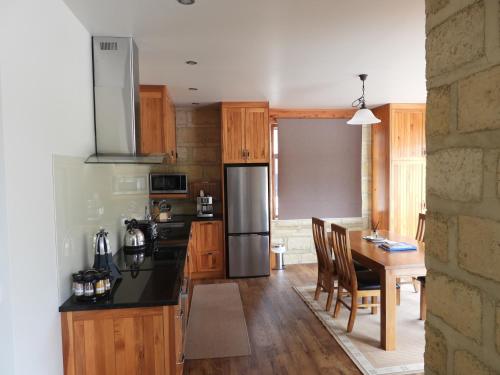 Kitchen, Mahana Farm Cottage in Mahana