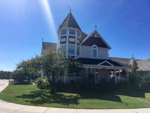 Charming Victorian Home in Okotoks Elegant Comfort Modern Convenience