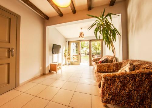 Sala de estar / sala de TV, Domek pod Grabami in Ilha de Sobieszewo